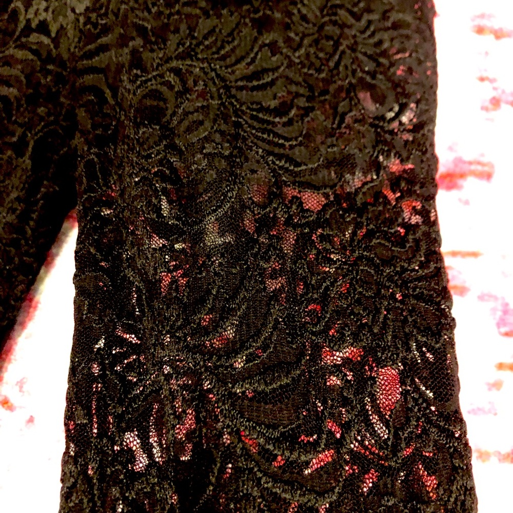 Bebe- LACE JUMPSUIT- never worn. Lace long sleeve, pants, shorts underneath.